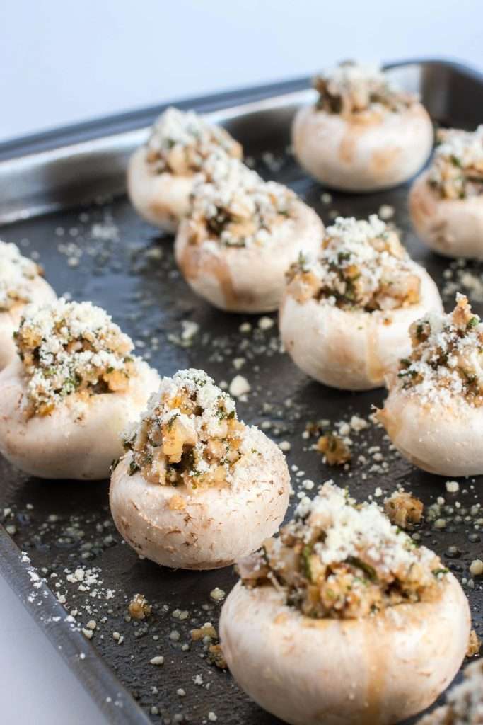 Stuffed mushrooms on a baking sheet