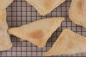 Apple turnovers on a baking sheet