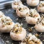 Stuffed mushrooms on a baking sheet